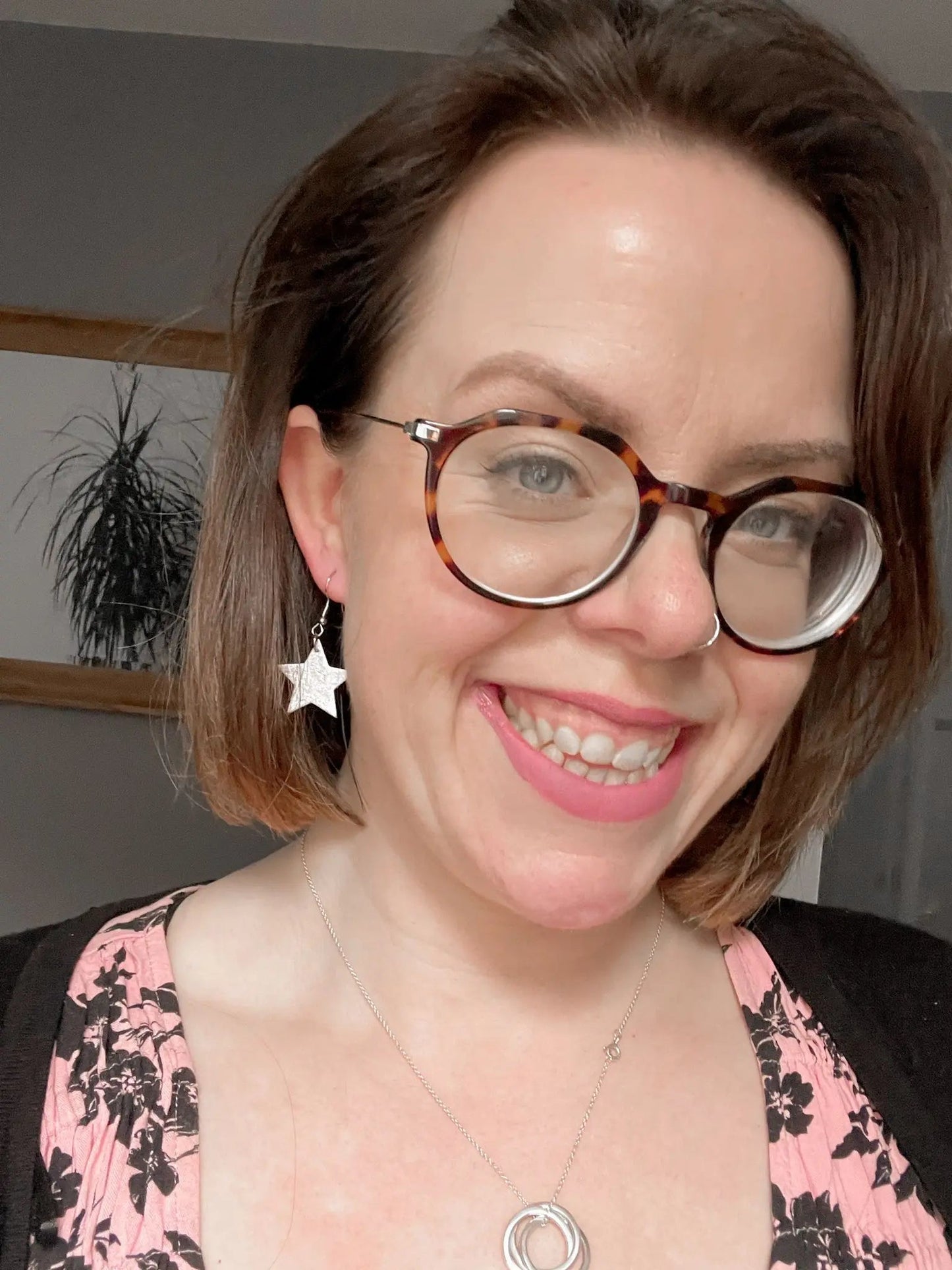 Mini silver star earrings