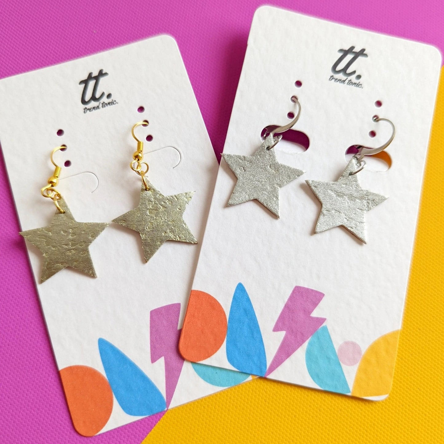 Mini silver star earrings